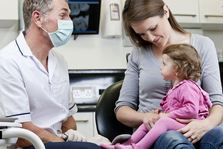 child-parent-with-dentist